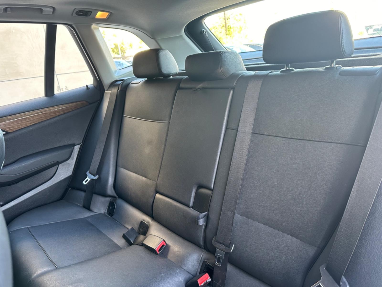 2014 WHITE /Black BMW X1 Leather (WBAVL1C56EV) with an 4 Cylinders engine, AUTOMATIC transmission, located at 30 S. Berkeley Avenue, Pasadena, CA, 91107, (626) 248-7567, 34.145447, -118.109398 - Don't let bad credit or financial setbacks hold you back from owning a luxury SUV like the 2014 BMW X1 xDrive28i. At our BHPH dealership, we're here to make the car-buying process as smooth and stress-free as possible. We invite you to visit our dealership in Pasadena, CA, to explore our inventory o - Photo #10